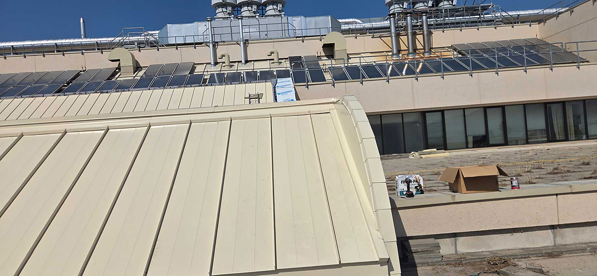 Interior-Roofing-new-commercial-metal-roof-in-beige