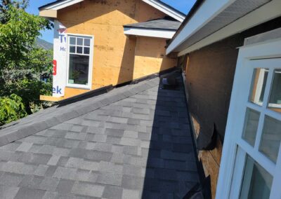 Interior Roofing new grey shingles on home