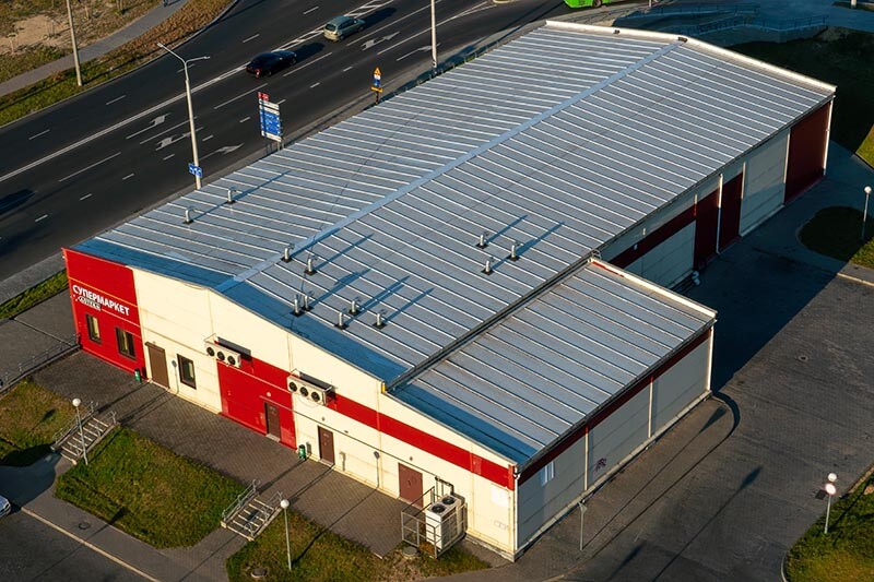 Metal Roof vs. Shingle Roof in BC: Which Is Better for Your Business in 2026?